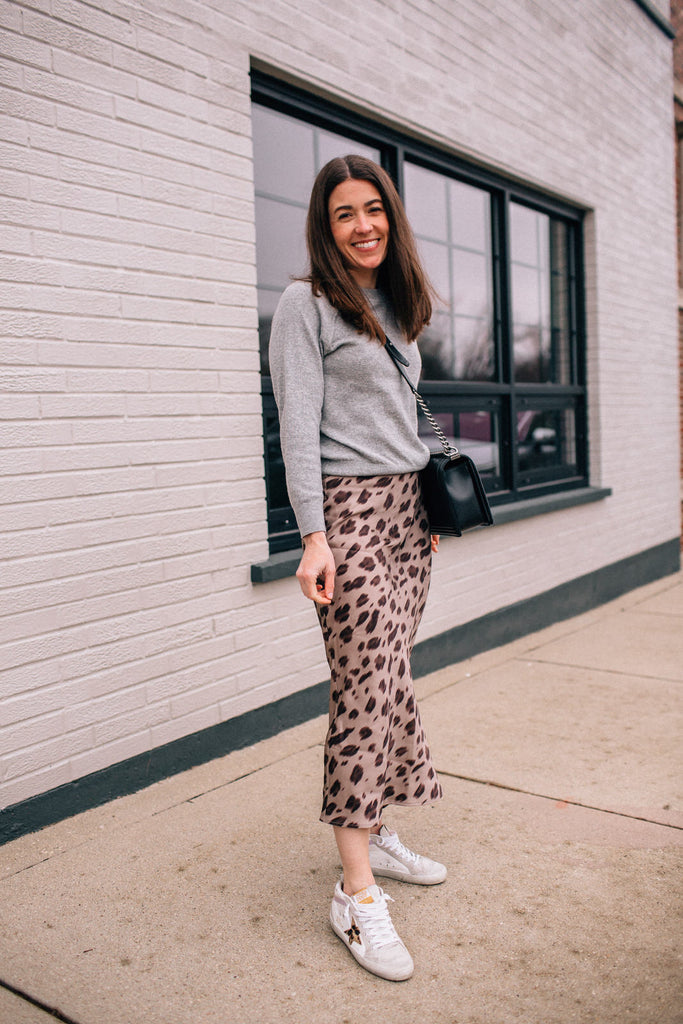 Shop this look: Everlane Cashmere Sweater, Anine Bing Leopard Skirt (on sale! true to size), Golden Goose Mid Star Sneakers, Chanel New Medium Boy Bag