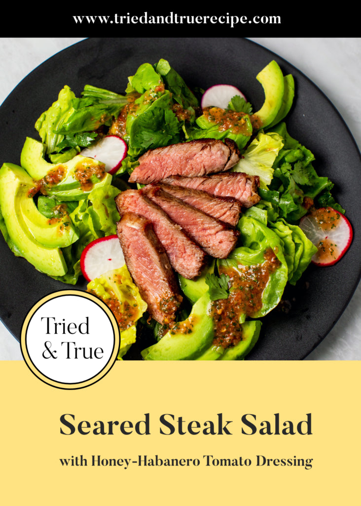 This seared steak salad is topped with a sweet and spicy honey-habanero tomato dressing for a an easy, flavor-packed, healthy weeknight meal.
