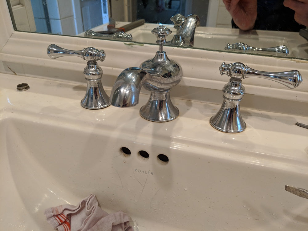 How do you remove the handles on this faucet
