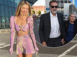 Georgia Toffolo dazzles in a puff sleeve bra top as she joins Will Ferrell at Eurovision final